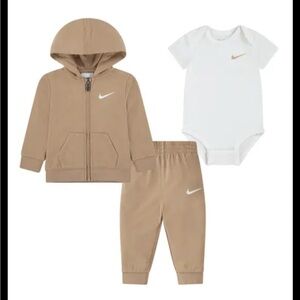Baby Nike hoodie, bodysuit, and onesie